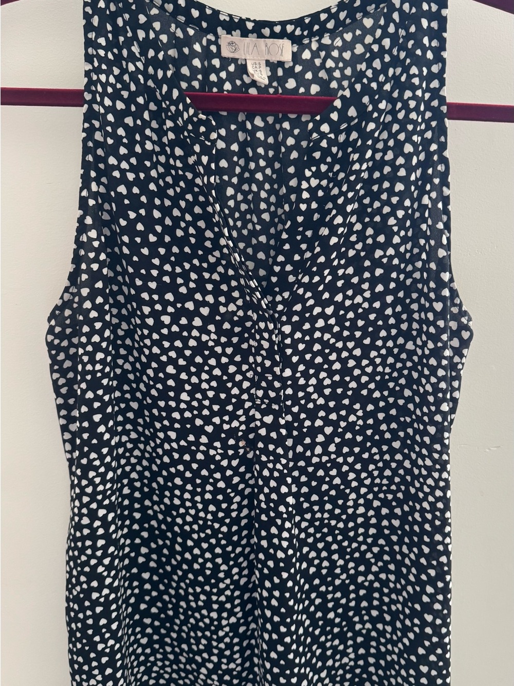 Lila Rose Black Sleeveless V Neck Tank with White Heart Print